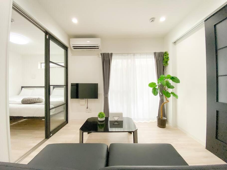 Residential Hotel Glitter Usjまで1駅5分 Osaka Habitación foto