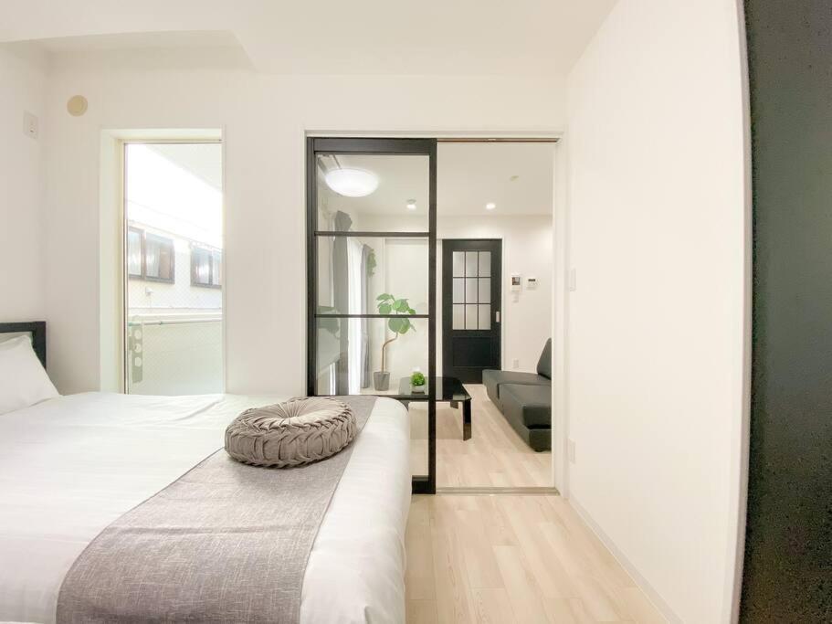 Residential Hotel Glitter Usjまで1駅5分 Osaka Habitación foto