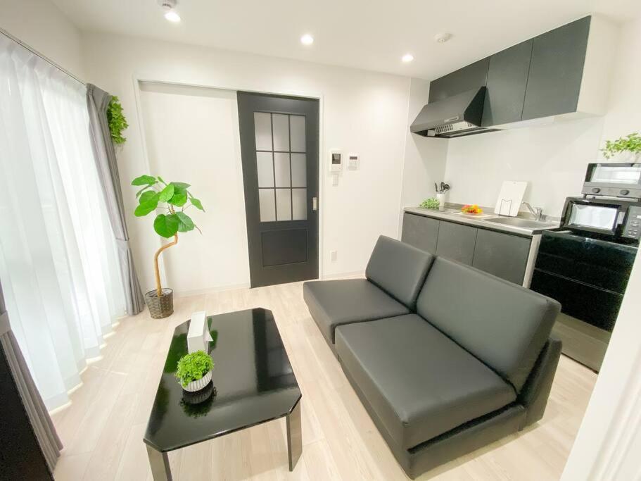 Residential Hotel Glitter Usjまで1駅5分 Osaka Habitación foto