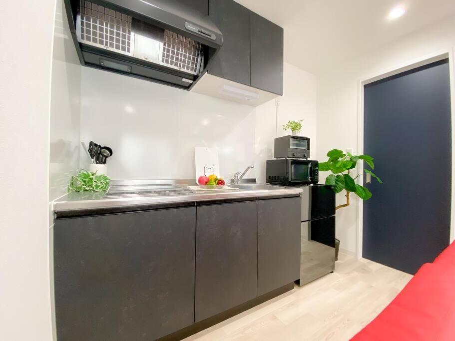 Residential Hotel Glitter Usjまで1駅5分 Osaka Habitación foto