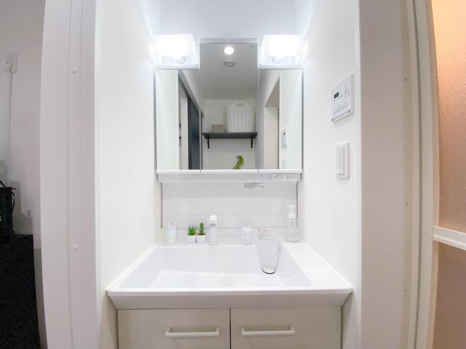 Residential Hotel Glitter Usjまで1駅5分 Osaka Habitación foto