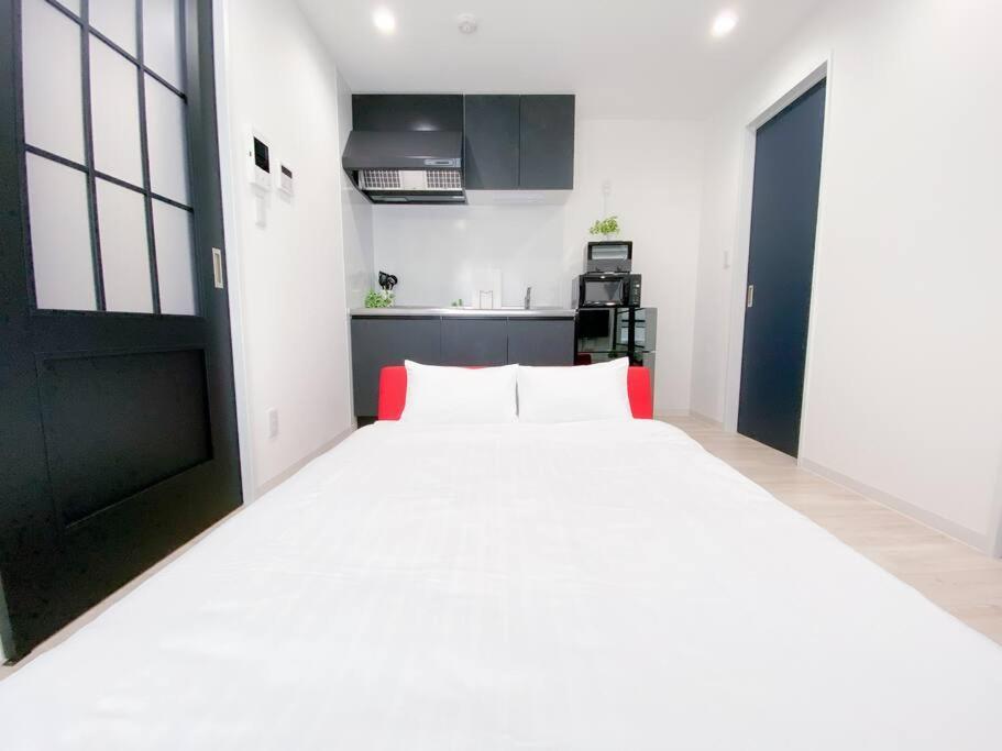 Residential Hotel Glitter Usjまで1駅5分 Osaka Habitación foto