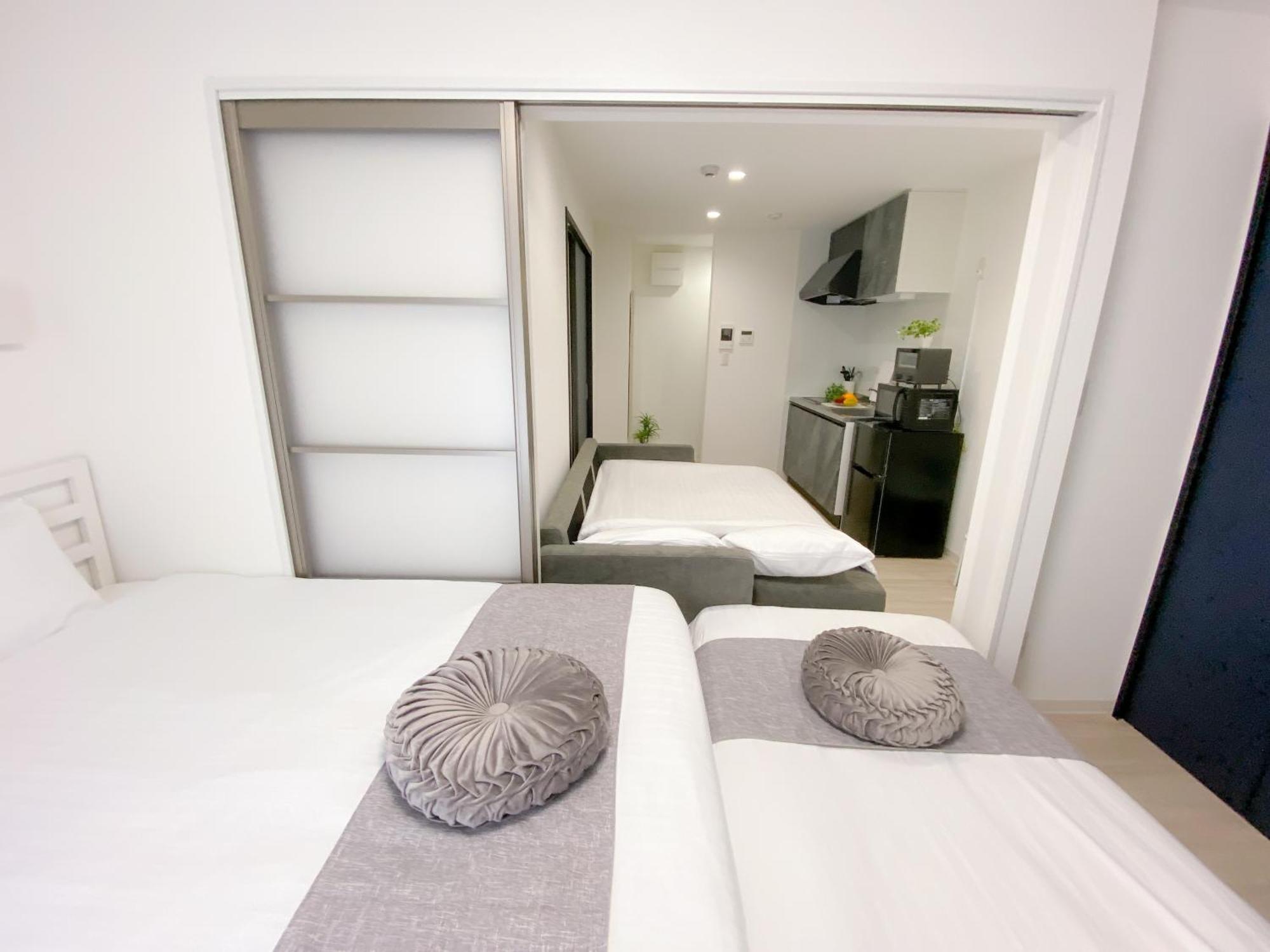 Residential Hotel Glitter Usjまで1駅5分 Osaka Exterior foto